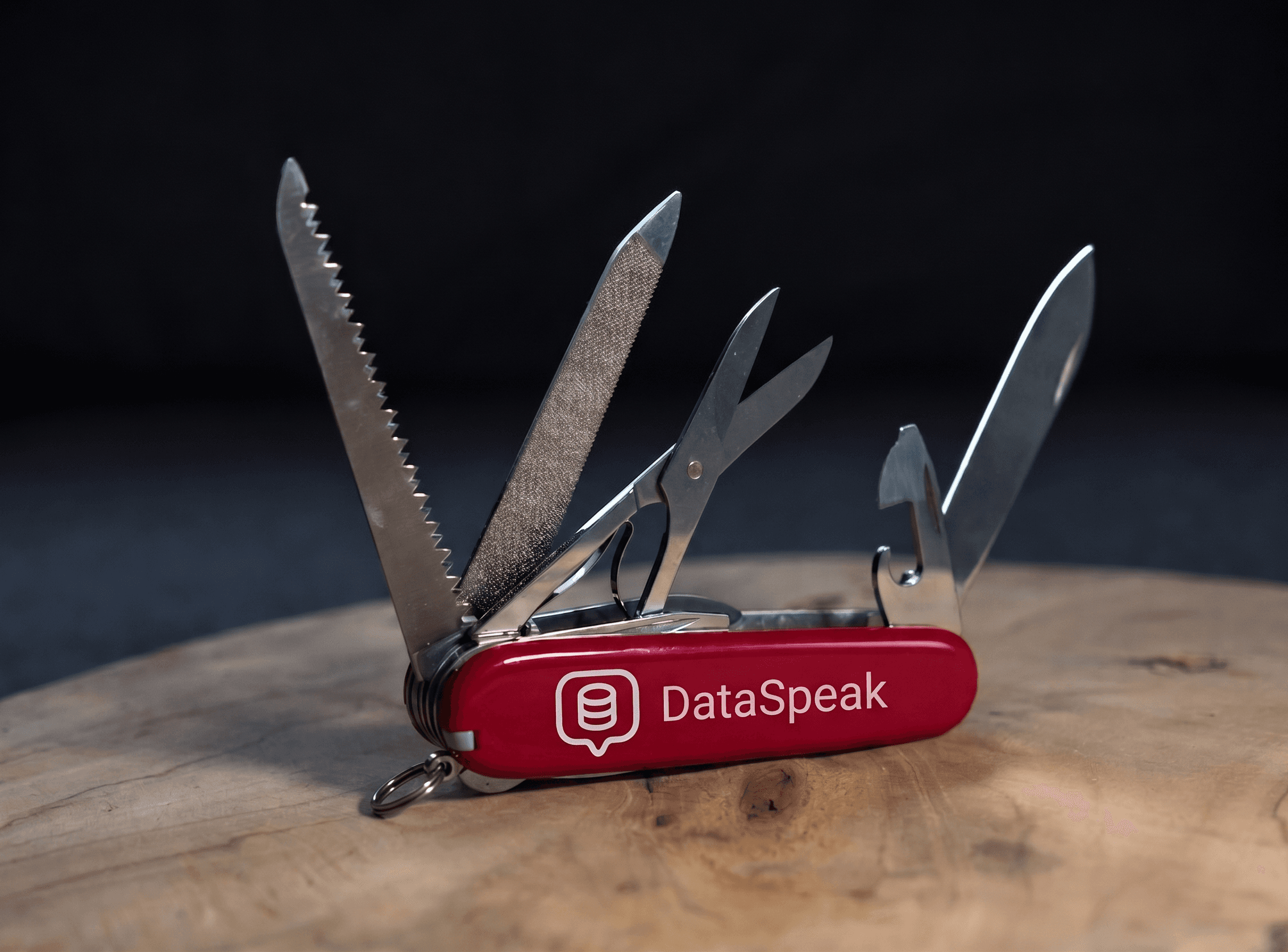 Red Swiss army knife on a wooden table